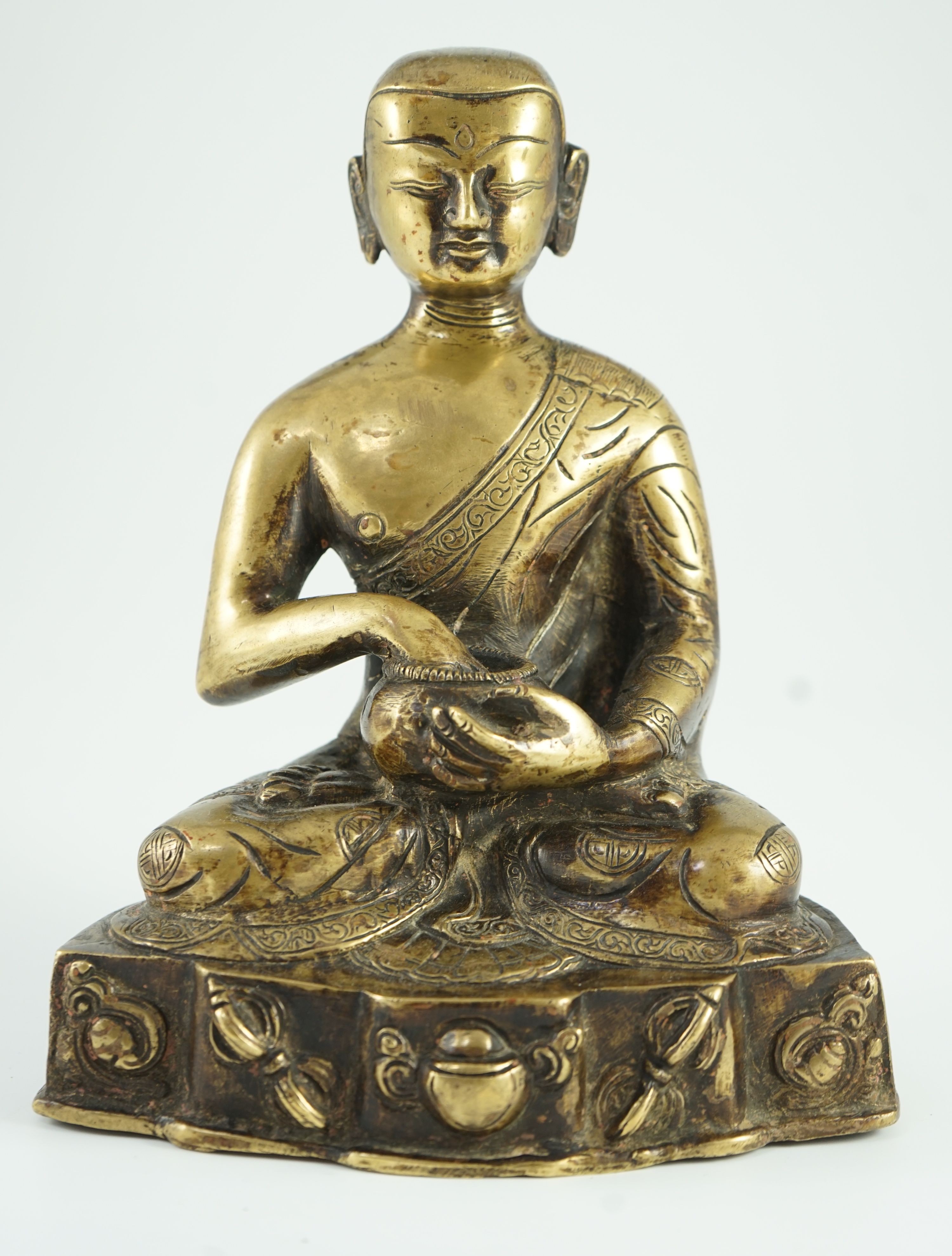 A Himalayan bronze figure of Buddha, 19th century, 21.5cm high